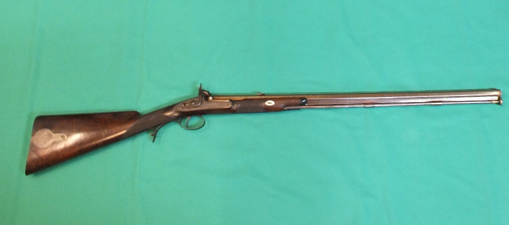 A muzzle loading percussion rifle of approx .40" bore by Hanson.