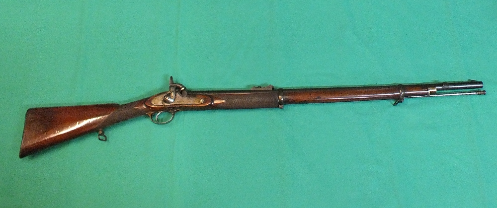 A .577 two band volunteer Enfield patt. rifle by Pritchett. Complete with rod and nipple projector.