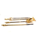 A heavy set of three Victorian Brass fire irons,