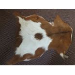 Two goat skin rugs