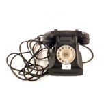 A black Bakelite telephone