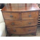 A 19th Century Mahogany bow fronted chest of three drawers on bracket feet