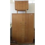 A Symbol Furniture bedroom suite comprising a wardrobe, a chest of drawers,