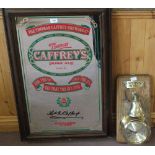 A ships clock and bell plus a reproduction Caffreys wall mirror