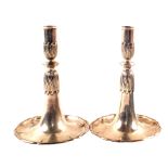 A pair of Swiss Silver candlesticks with spiral column on wide shaped bases, height 8 1/2",