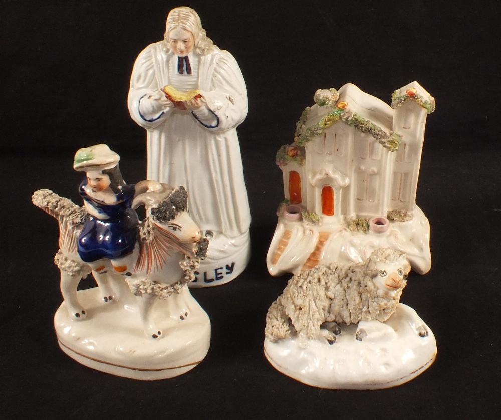 A 19th Century Staffordshire girl on goat, sheep,