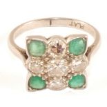 A Platinum Diamond and Emerald set ring,