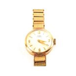 A 9ct Gold cased lady's wristwatch on 9ct Gold strap