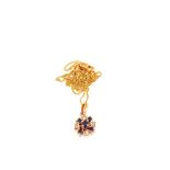 A 9ct Gold Sapphire and Diamond set circular pendant on a 9ct Gold chain