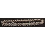 A hallmarked Tiffany and Co Platinum and Diamond set line bracelet,