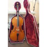 A cased European cello and bow in a red hardened outer case with soft red velvet interior,