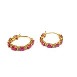 A pair of 9ct Gold Ruby and Diamond hoop earrings