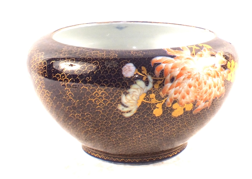 A Japanese blue and white floral bowl (rim chip)