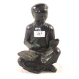 A Chinese soapstone seated scholar