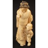A Japanese Meiji period Ivory group of a mother and child