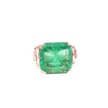 A large square step cut set Emerald ring, Emerald approx 12.