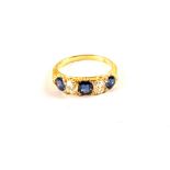 A five stone Sapphire and Diamond set ring,