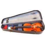 A cased German violin c1910,