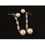A pair of 9ct White Gold Pearl and Diamond set drop earrings