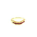 A square cut Ruby set ring stamped 750,