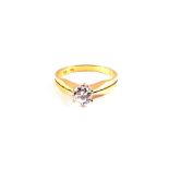 An 18ct Gold solitaire Diamond ring, approx 0.