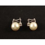 A pair of large Pearl set earrings (Pearls measuring x 13.