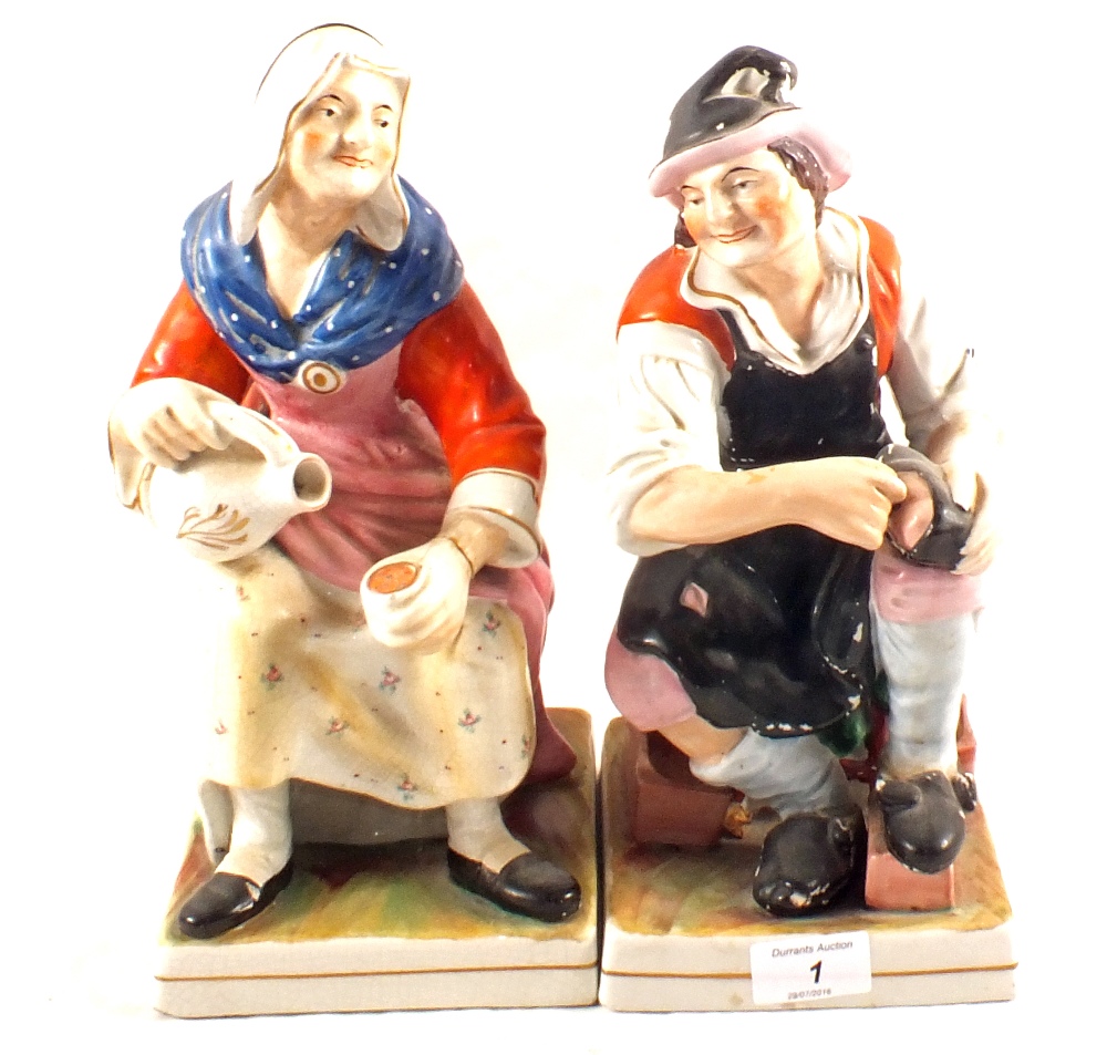A pair of 19th Century Staffordshire figures,