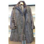 A lady's brown mink coat