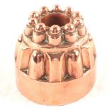 A Victorian circular Copper jelly mould of castle shape,