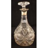 A Silver rim cut glass decanter,