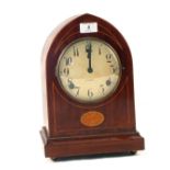 An Edwardian inlaid Mahogany striking mantel clock with Gilbert movement