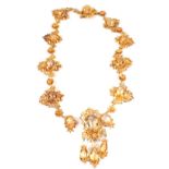 A continental Gold choker necklace set with large oval and Pearl shaped Citrine stones within