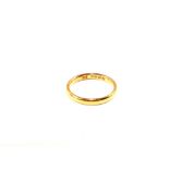 A 22ct Gold band ring,