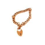 A 9ct Gold bracelet with 9ct Gold padlock heart clasp
