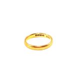 A 22ct Gold band ring,
