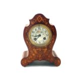 An Edwardian inlaid Rosewood mantel clock of waisted form and floral enamel dial