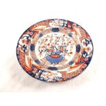 An 18th Century Chinese blue and red floral plate (repaired),