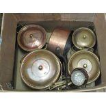 Four Copper lidded cooking pots,