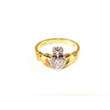 An 18ct Gold Claddagh ring with central heart shaped Diamond,