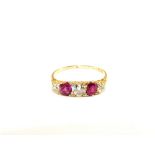 An 18ct Gold five stone Ruby and Diamond ring,