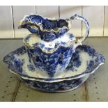 A Victorian blue and white floral toilet jug and bowl