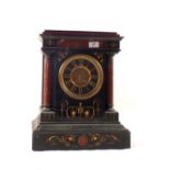 A substantial Victorian black and rouge marble mantel clock