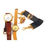 A 9ct Gold ladys wristwatch on leather strap,