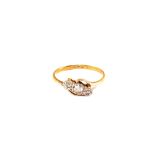 An 18ct Gold three stone ring,