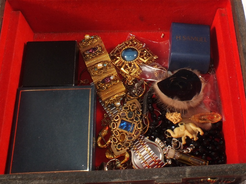 A jewellery casket containing costume jewellery