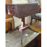 A Victorian Mahogany two flap work table with two fitted drawers on square column and quatrefoil