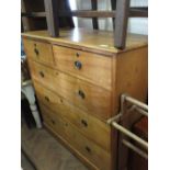 A Victorian Satinwood chest of two short and three long drawers