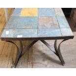 An iron based coffee table with granite top