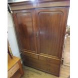 A Victorian Mahogany two drawer wardrobe with two short and three long drawers