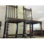 A set of four Oak barley twist dining chairs